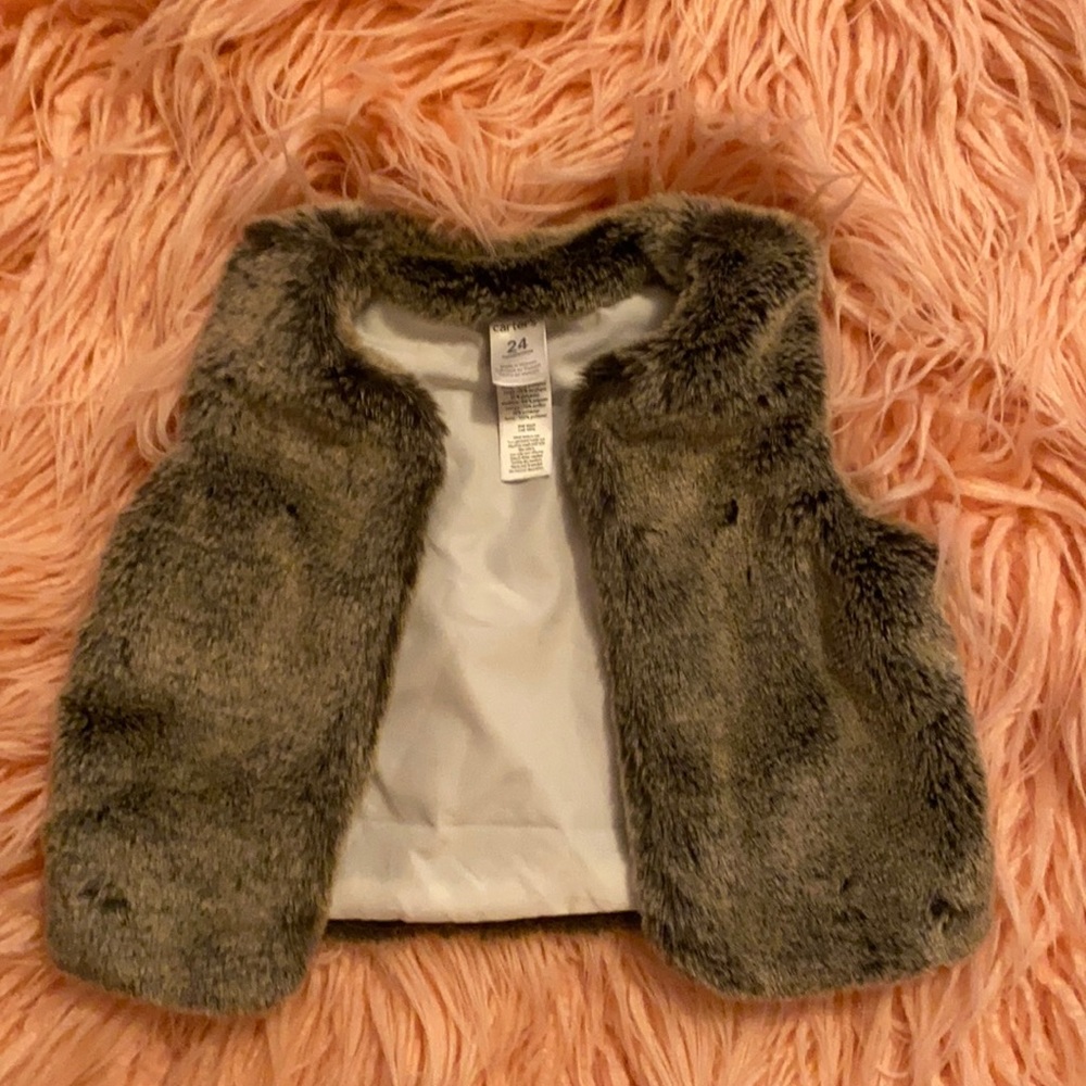 Carters faux fur vest size 24 months. Never worn